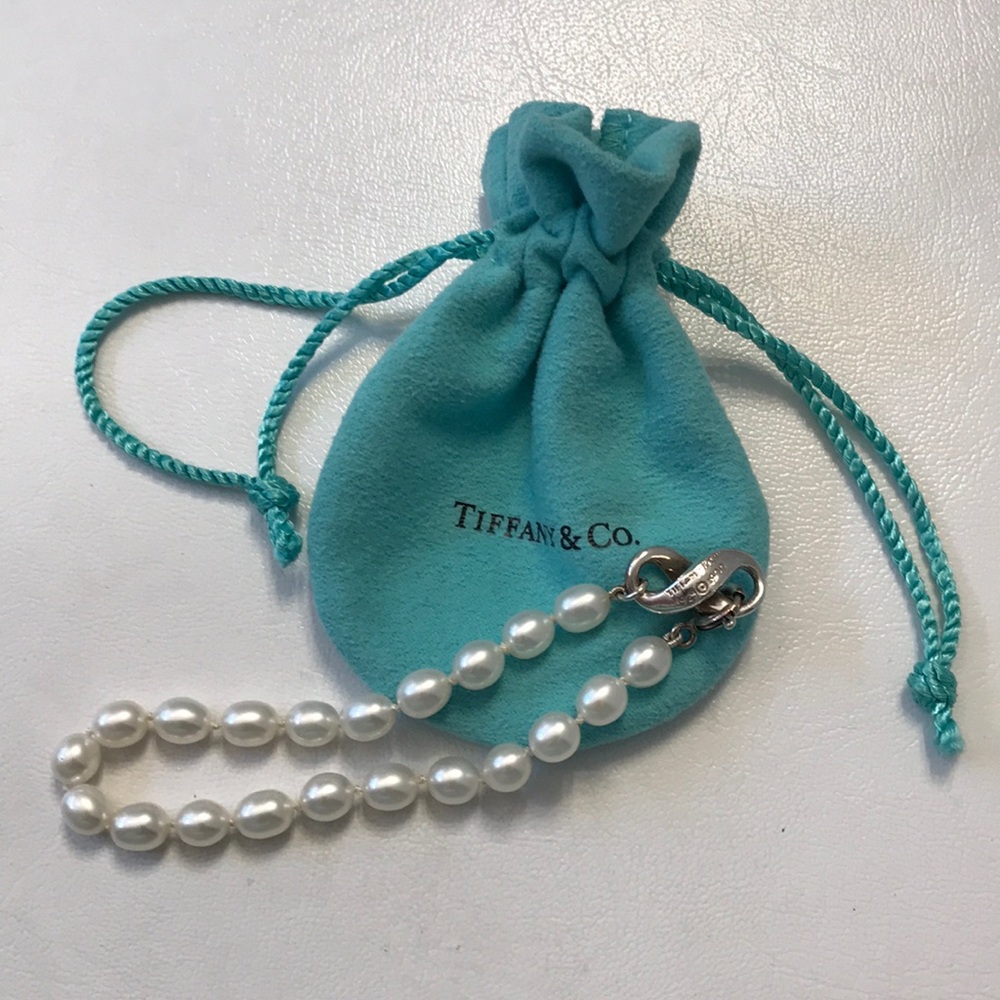 Tiffany & Co. Pearl and 925 SS Infinity Bracelet.